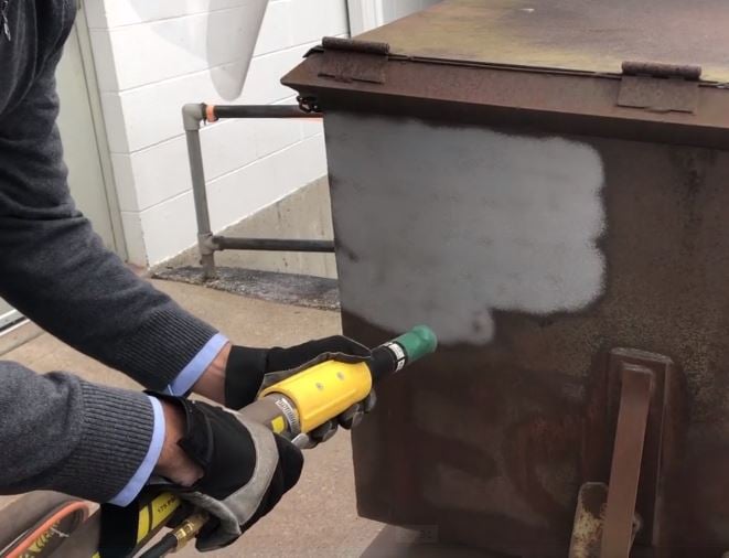 Paint and coating stripping with dry ice blasting + abrasive
